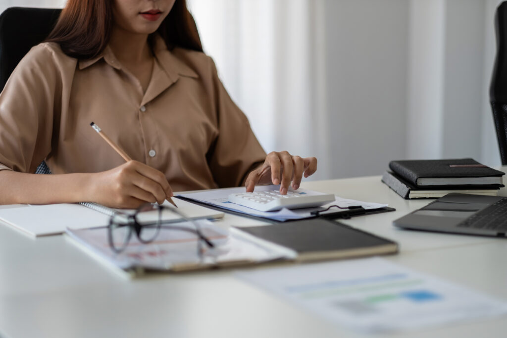 woman calculating expenses