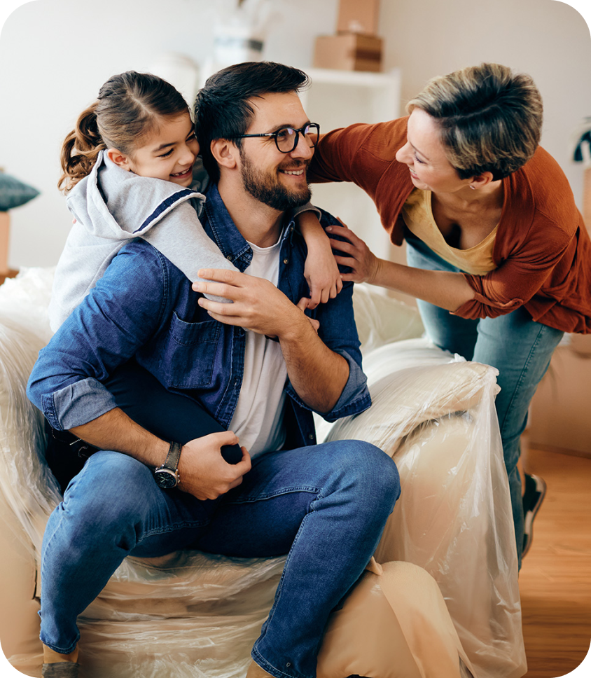 father and mother with their young daughter